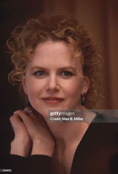 Headshot Of Hawaiian Born Actor Nicole Kidman Smiling With Her Hands