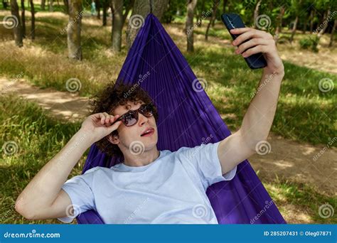 A Young Guy Takes A Selfie On The Phone Stock Image Image Of Person Enjoying 285207431