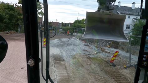 CAT 335 Next Gen With OilQuick And Rototilt Putting Some Pipes In The