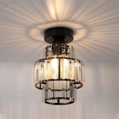 Lustre Plafonnier Noir Ou Dor Avec Un Effet Cristal Luminaires Tendance