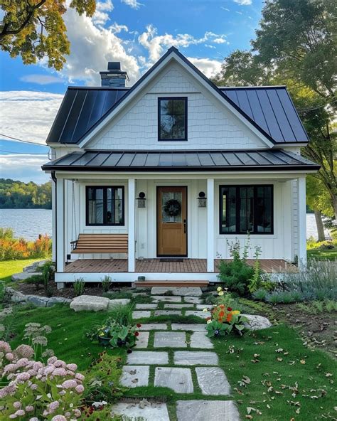 Tour this white tiny home by lake. The interior is perfectly farmhouse ...