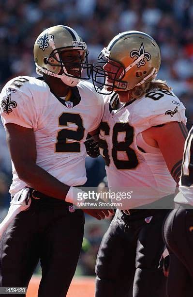 Quarterback Aaron Brooks of the New Orleans Saints receives ...