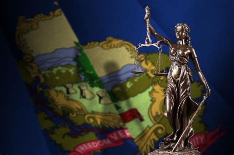 Premium Photo Vermont Us State Flag With Statue Of Lady Justice And