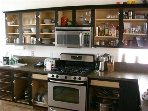 Black kitchen cabinets with glass doors | Hawk Haven