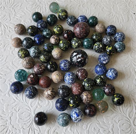 At Auction Vintage Vacor Confetti Speckled Marbles 65 And Shooters Too