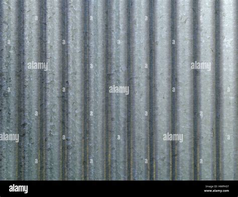 Corrugated metal galvanized wall plate background Stock Photo - Alamy