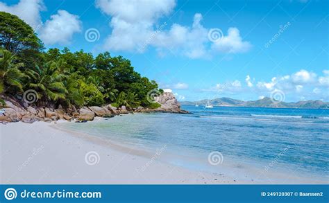 Anse Patates Beach La Digue Island Seyshelles White Beach With Blue