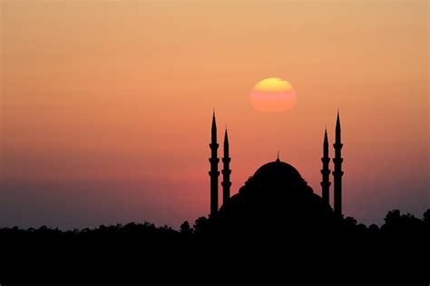 Premium Photo Mosque Silhouette In Front Of Sunset Background