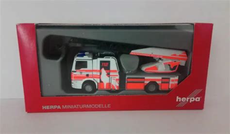 095129 HERPA MAN TGS M Drehleiter DLK Feuerwehr Wolfsburg 1 87 EUR 61