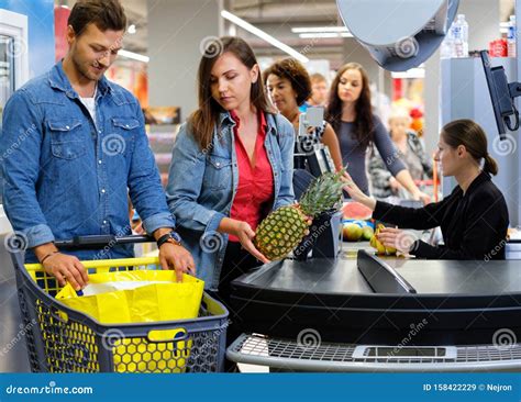 People Buying Goods In A Grocery Store Stock Image Image Of Employee