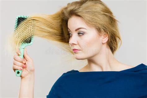 Woman Brushing Her Long Hair With Brush Stock Photo Image Of Straight