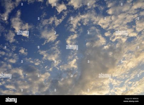 Sunny blue sky with clouds Stock Photo - Alamy