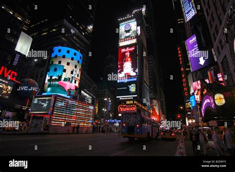 Times Square lights at night - New York City, USA Stock Photo - Alamy