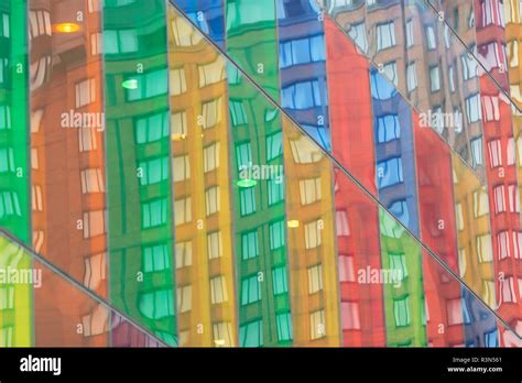 Building Reflecting In Colorful Windows Of Montreal Convention Center