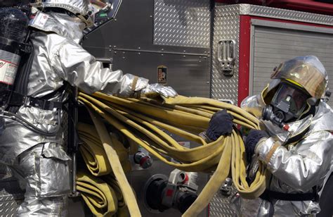 Two US Air Force USAF Firefighters From The 65th Civil Engineer