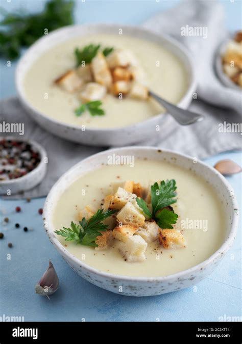 cauliflower soup puree vertical Stock Photo - Alamy