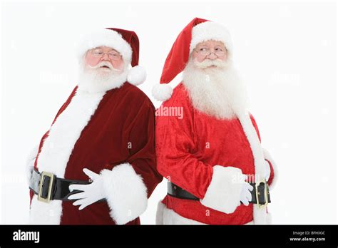 Two Men Dressed As Santa Claus Stock Photo Alamy