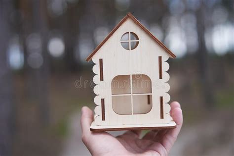 Miniature Wooden House Male Hand Outdoor Nature Real Estate Concept Modern Housing Eco