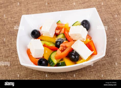 Greek salad with feta cheese Stock Photo - Alamy