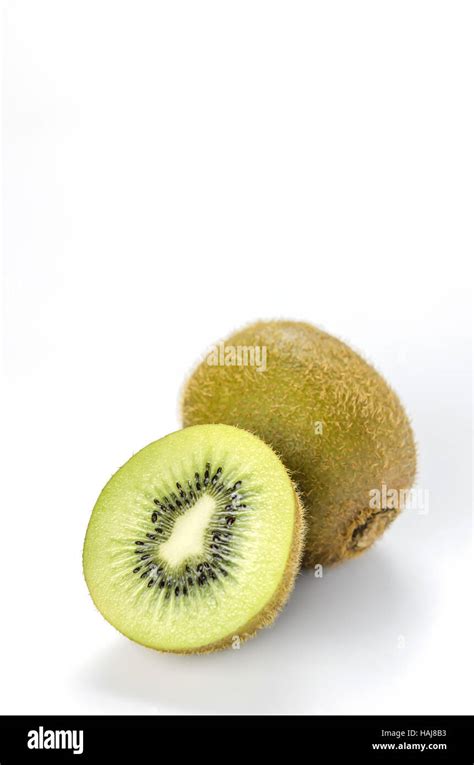 Delicious Whole Kiwi Fruit And Half On White Background Stock Photo Alamy