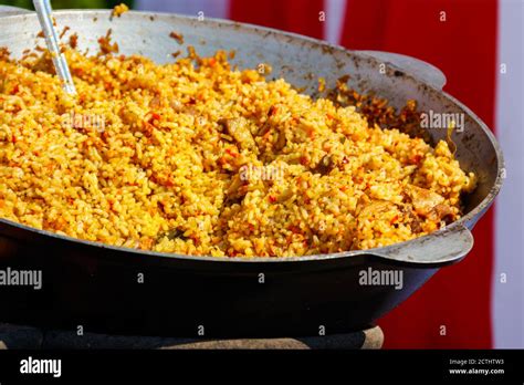 Cooking of pilaf with meat and spices Stock Photo - Alamy