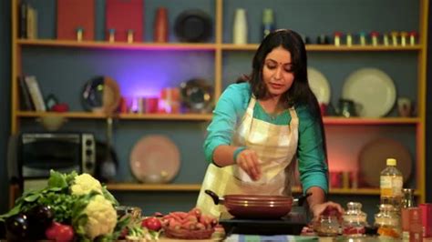 An Indian woman cooking deliciously in ... | Stock Video | Pond5