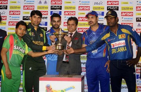 Captain with Asia Cup Trophy - Cricket Images & Photos