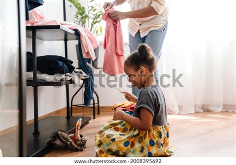 Black Girl Smiling Playing Kitten While Stock Photo 2008395692 ...