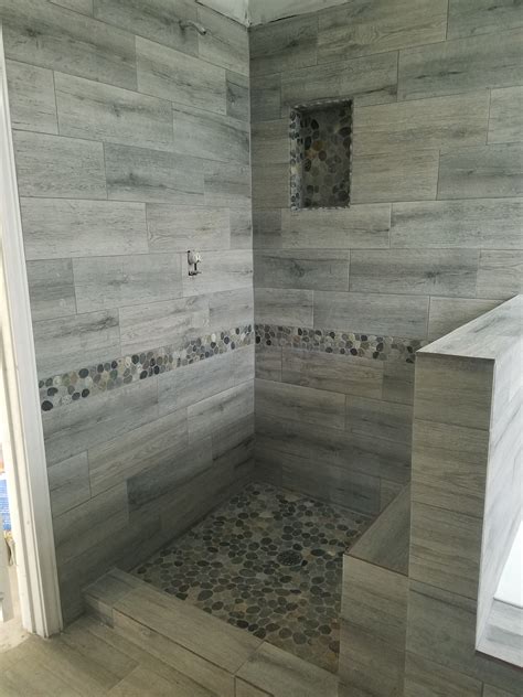 Stunning Shower Stall Using Sliced Bali Ocean Pebble Tile Flooring