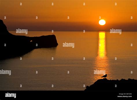 Sunset at Worm's Head, Gower, Wales Stock Photo - Alamy