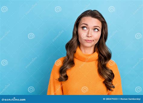 Photo Of Doubtful Unsure Woman Wear Orange Sweater Looking Emtpy Space