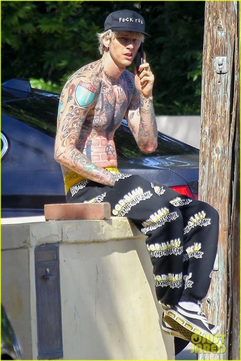 Machine Gun Kelly Shows Off Fully Tattooed Torso While Shirtless Photo