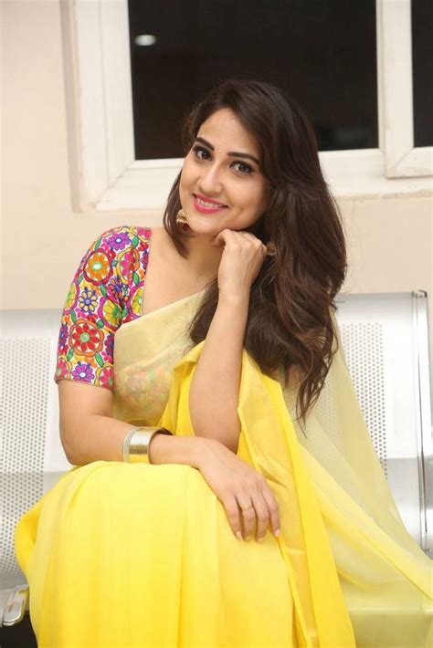 Tv Anchor Manjusha Long Hair Stills In Yellow Saree Tv Anchors Yellow