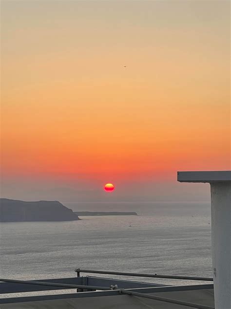 The Santorini sunset over the volcano : r/mildlyinteresting