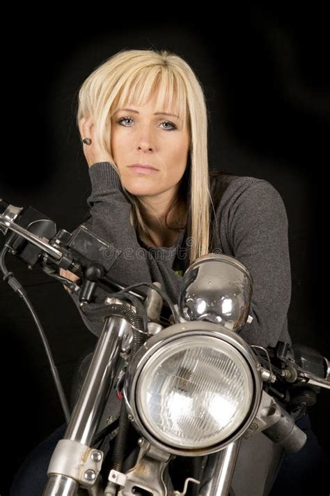 Woman Rider Sitting On Her Bike In The City Of Sturgis In South Dakota