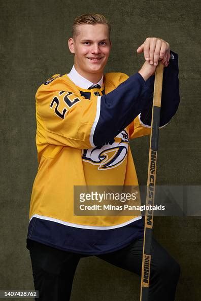 Joakim Kemell, #17 pick by the Nashville Predators, poses for a... News ...