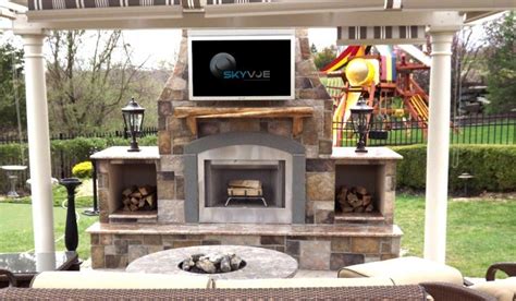 Outdoor Tv Pictures Skyvue Outdoor Tvs Outdoor Fireplace Plans Outdoor Tv Backyard Fireplace