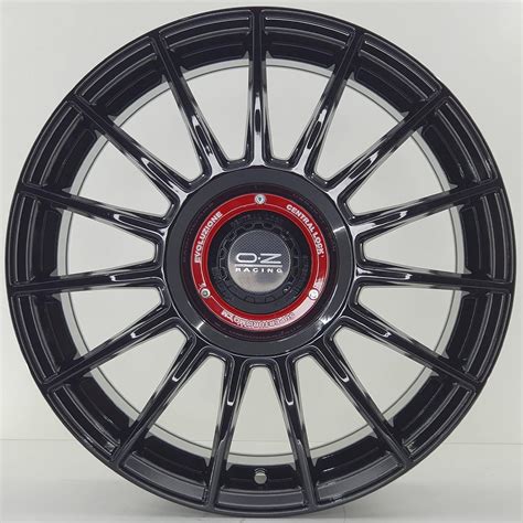 Jogo Rodas OZ Superturismo Nissan Aro 17x7 5 4x114 Preta Brilhante