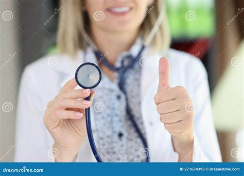 Woman Cardiologist Holding Stethoscope and Showing Thumb Up Gesture. Stock Image - Image of ...