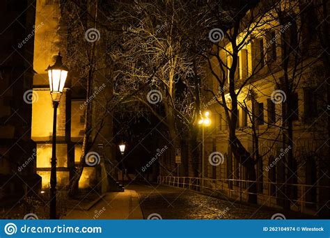 Dimly Lit Street Scene Among Houses In Nyamirambo An Outlying S