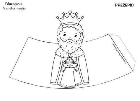 A Paper Doll With A Crown On It