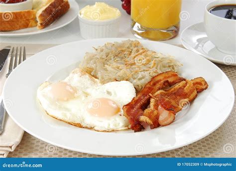 Bacon Eggs and Hash Browns stock image. Image of orange - 17052309