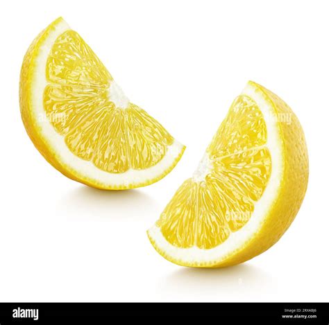 Ripe Slices Of Yellow Lemon Citrus Fruit Stand Isolated On White Background With Clipping Path