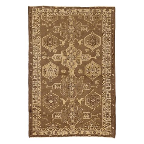 Antique Persian Shahsavan Rug With Brown And Ivory Floral Patterns For