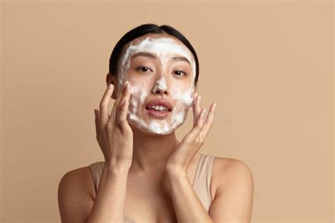 Face Skin Care Asian Woman Cleaning Facial Skin With Foam Soap Stock