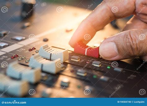 Hand Adjusting Volume Fader Of Digital Audio Mixer Stock Photo Image