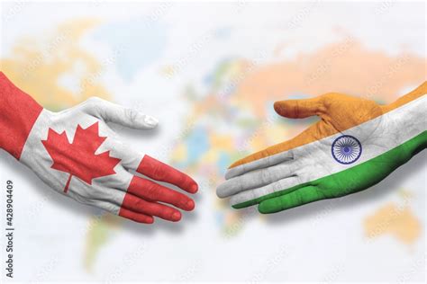 Canada and India - Flag handshake symbolizing partnership and cooperation Stock Photo | Adobe Stock