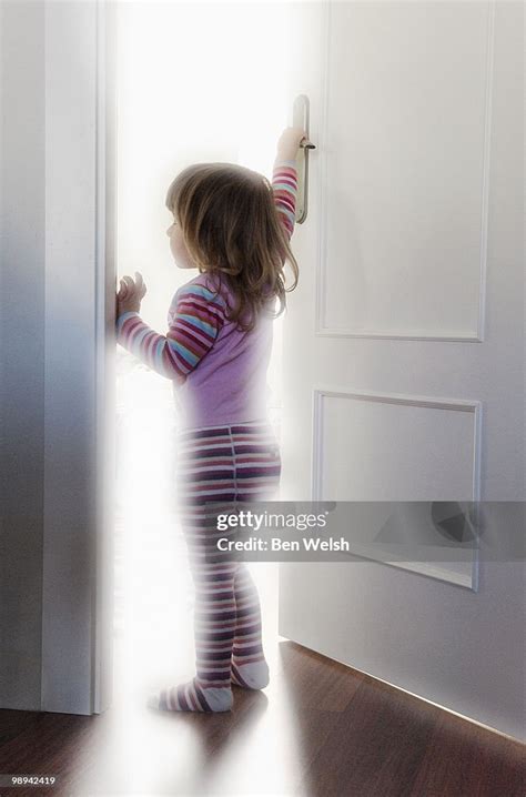 Child Opening Door High-Res Stock Photo - Getty Images