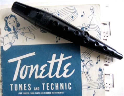 Musical instrument Tonette with book by Gollygollygolly on Etsy