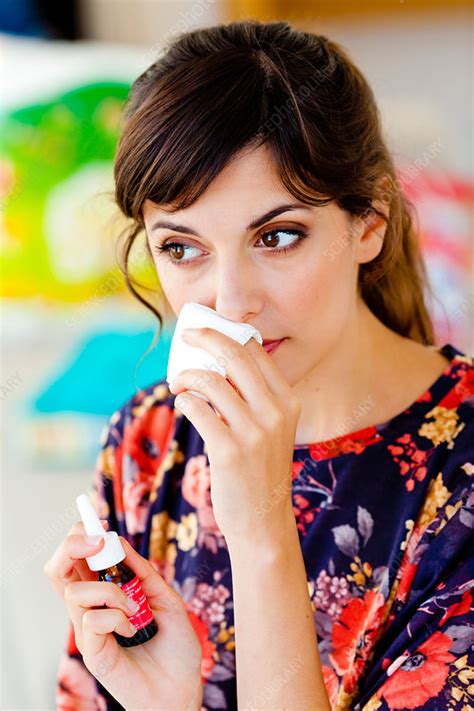 Woman Using Nasal Spray Stock Image C033 0090 Science Photo Library